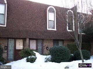 11893 B Academy Road, Unit J7 Philadelphia, PA 19154 - Photo 1 of 1 a front view of a house