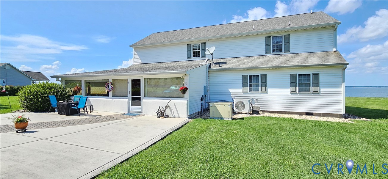 617 Sheepside Road Laneview, VA 22504 - Photo 2 of 9 White siding exterior with a screened porch, an ex