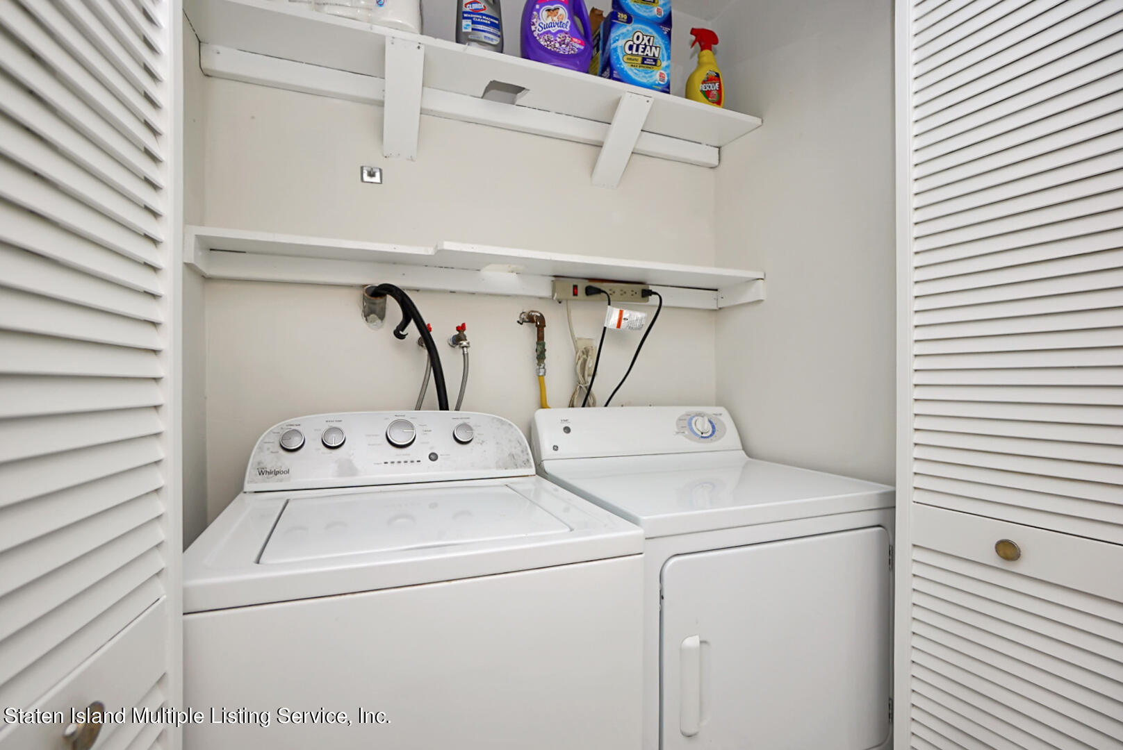 96 Hampton Green Staten Island, NY 10312 - Photo 16 of 24 a utility room with dryer and washer