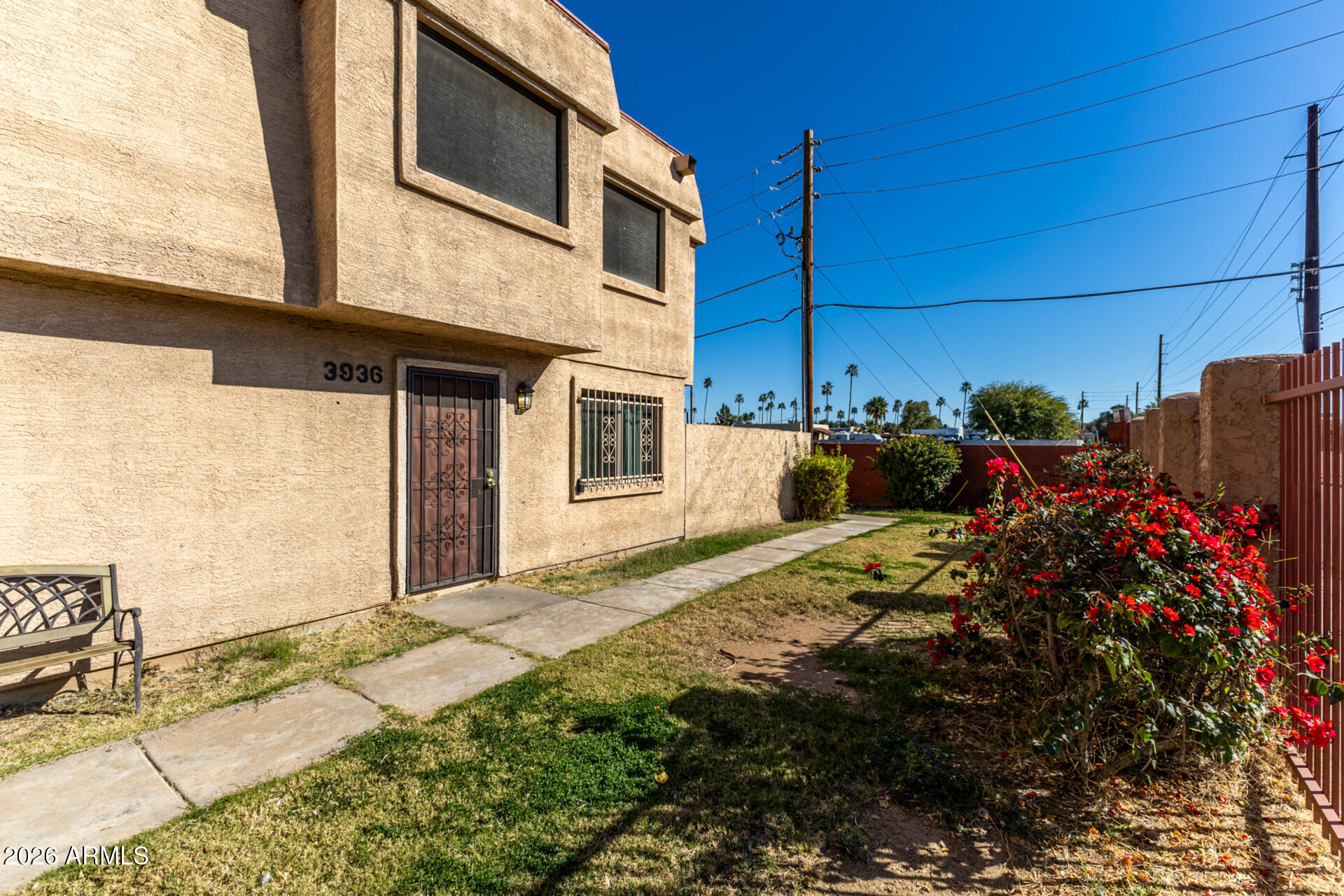 3936 West Camelback Road Phoenix, AZ 85019 - Photo 2 of 19 a view of a backyard of the house