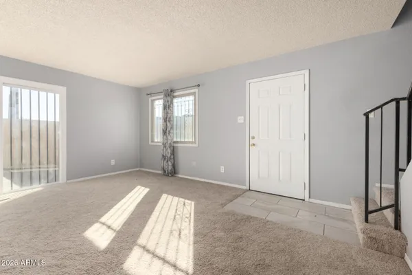 an empty room with windows