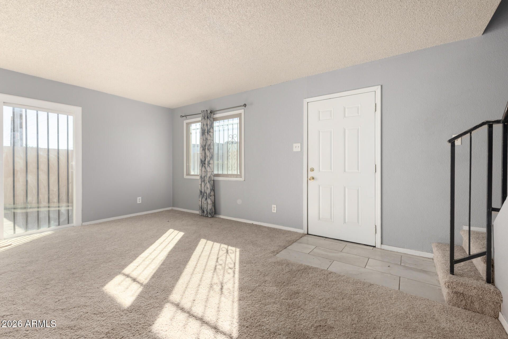 3936 West Camelback Road Phoenix, AZ 85019 - Photo 4 of 19 an empty room with windows