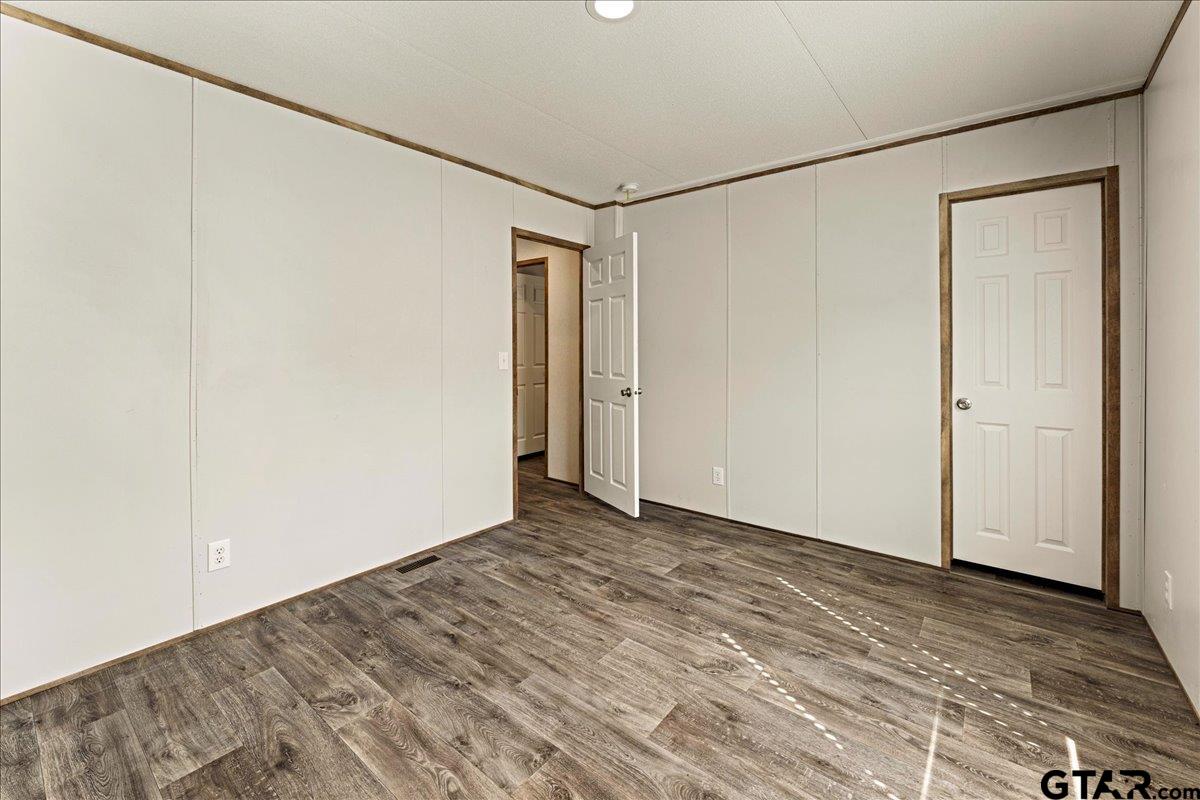 4776 County Road 4509 Athens, TX 75752 - Photo 22 of 25 a view of a room with wooden floor
