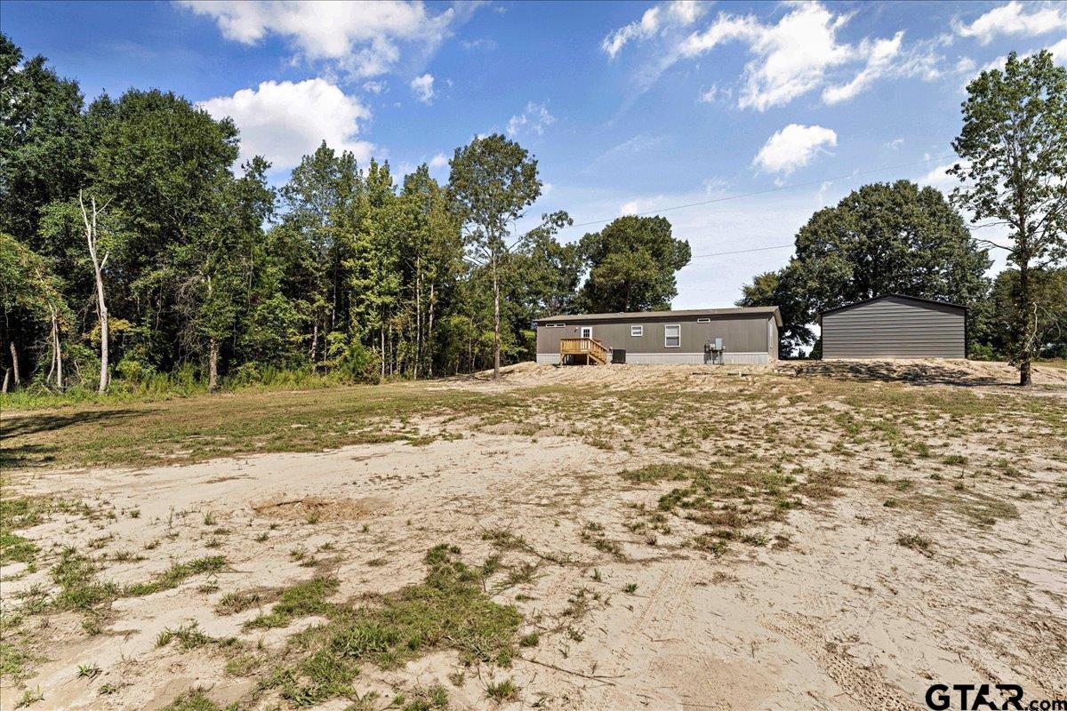 4776 County Road 4509 Athens, TX 75752 - Photo 6 of 25 a view of a outdoor space with trees