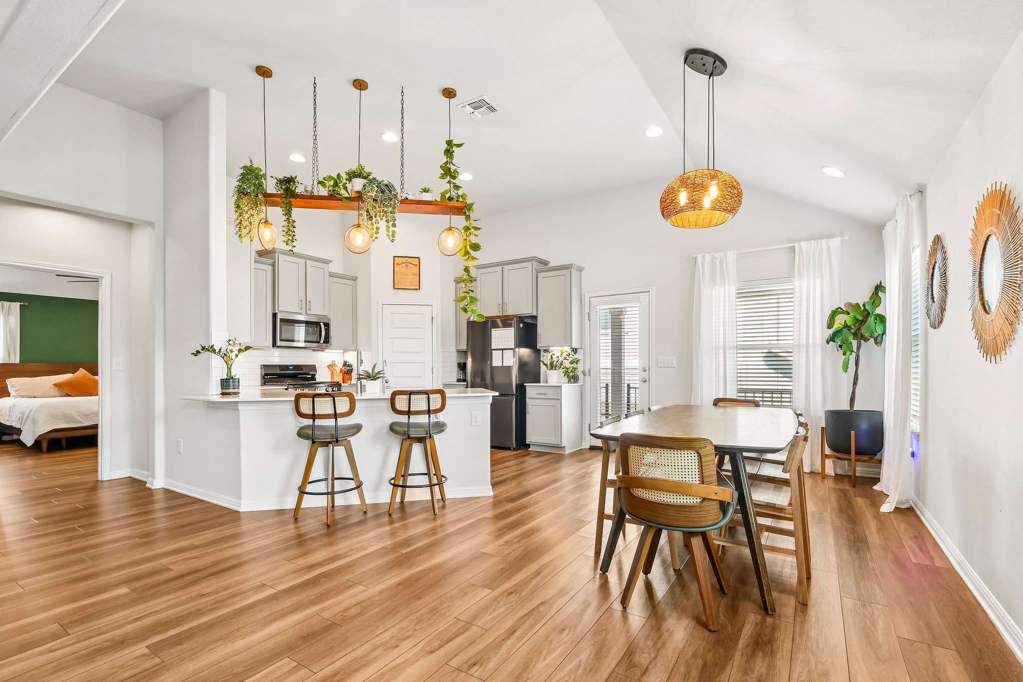 10700 Sentinel Drive Austin, TX 78747 - Photo 11 of 27 Kitchen, dining, and living all connected, so nobody gets stuck cooking in exile.