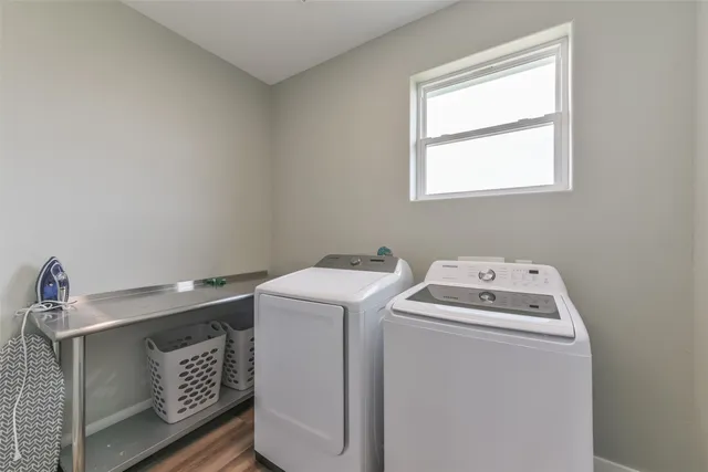 a utility room with dryer and washer