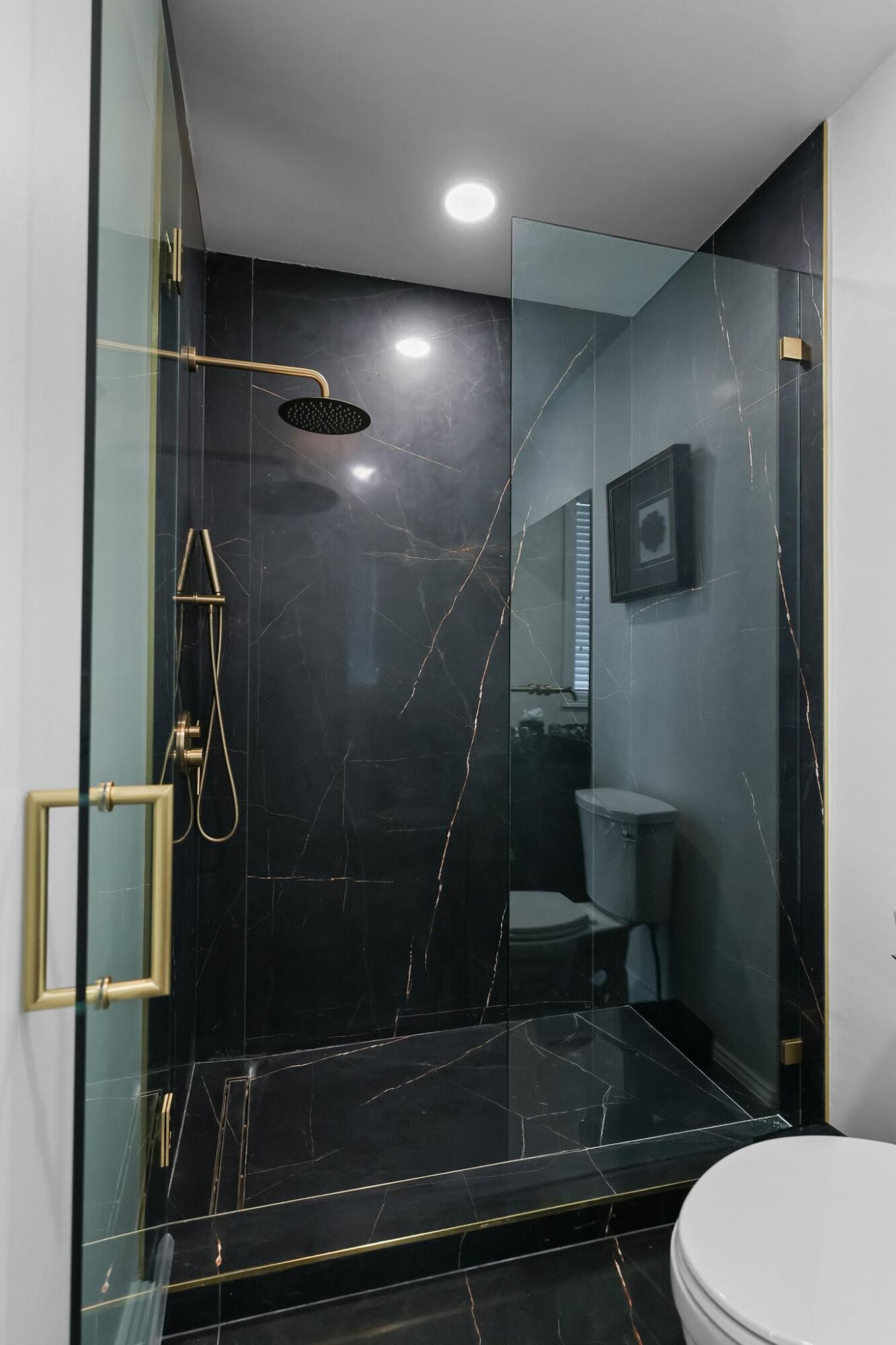 340 East Royal Palm Road Boca Raton, FL 33432 - Photo 30 of 59 a bathroom with a toilet and a shower