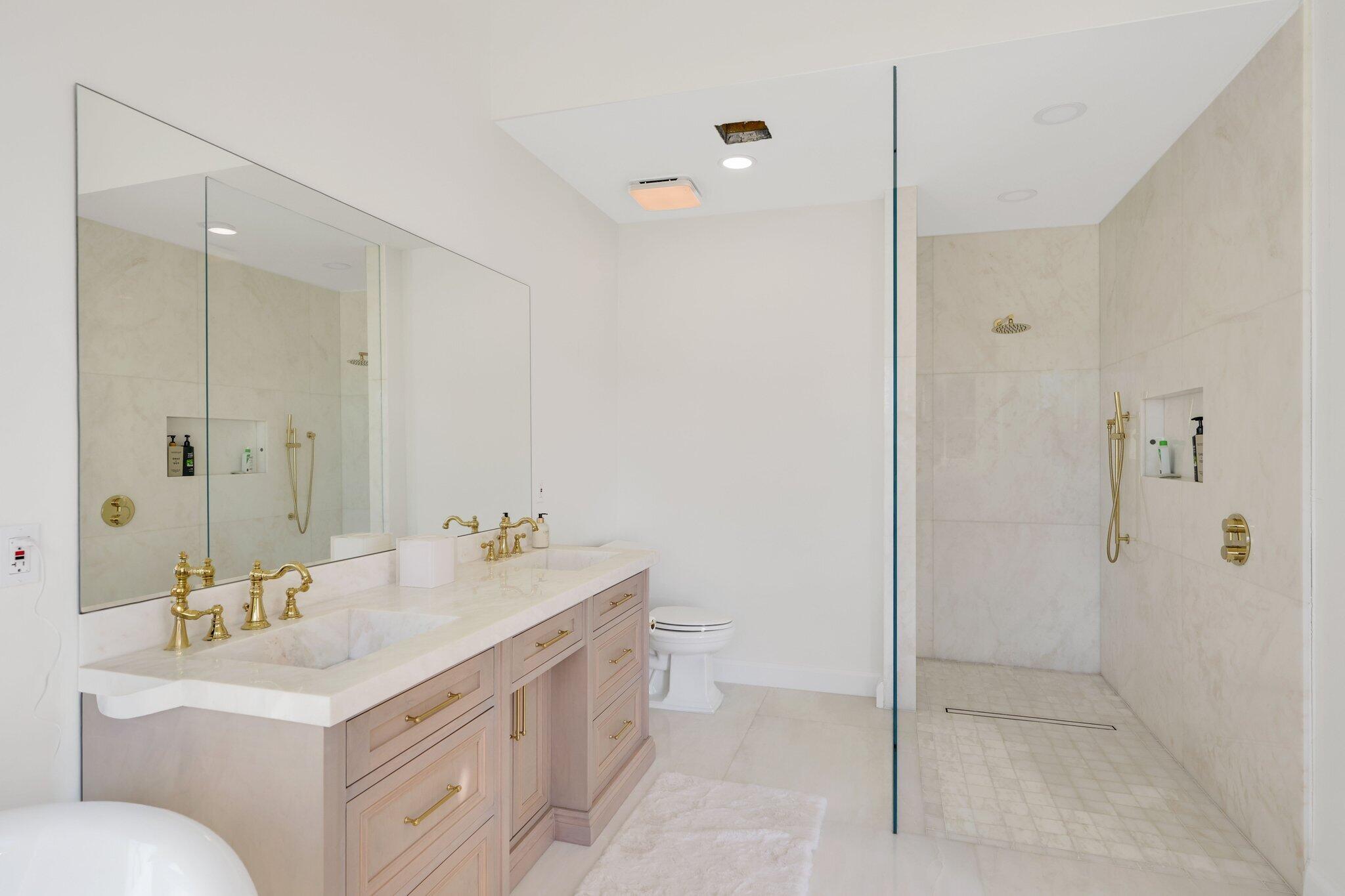 340 East Royal Palm Road Boca Raton, FL 33432 - Photo 43 of 59 a bathroom with a sink toilet and shower