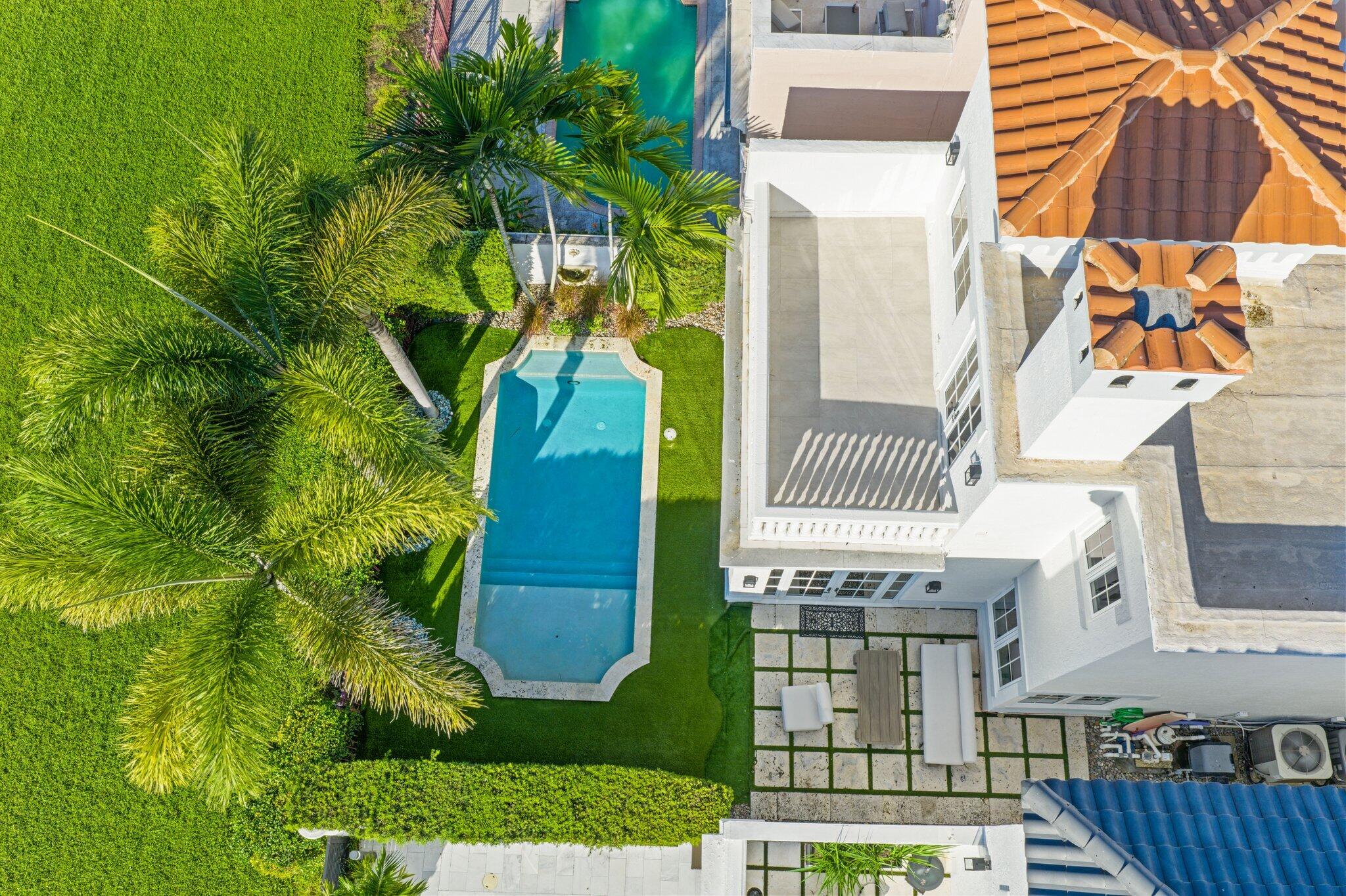 340 East Royal Palm Road Boca Raton, FL 33432 - Photo 55 of 59 a view of a house with a palm tree