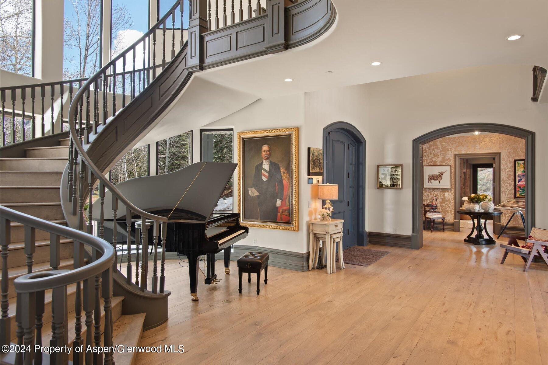 73 Hideaway Lane Aspen, CO 81611 - Photo 33 of 100 a view of a livingroom with furniture staircase and front door
