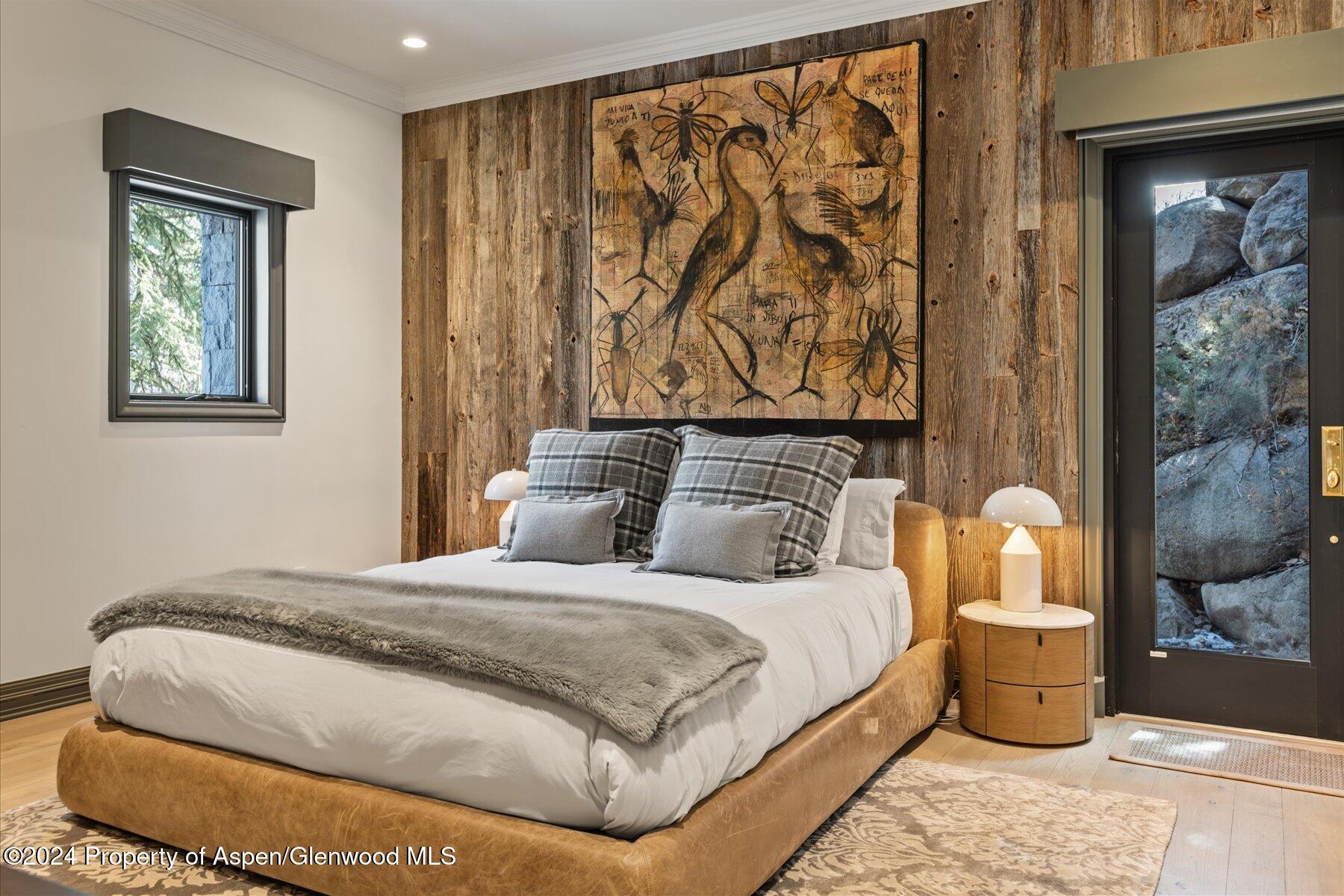 73 Hideaway Lane Aspen, CO 81611 - Photo 72 of 100 a bedroom with a bed and window