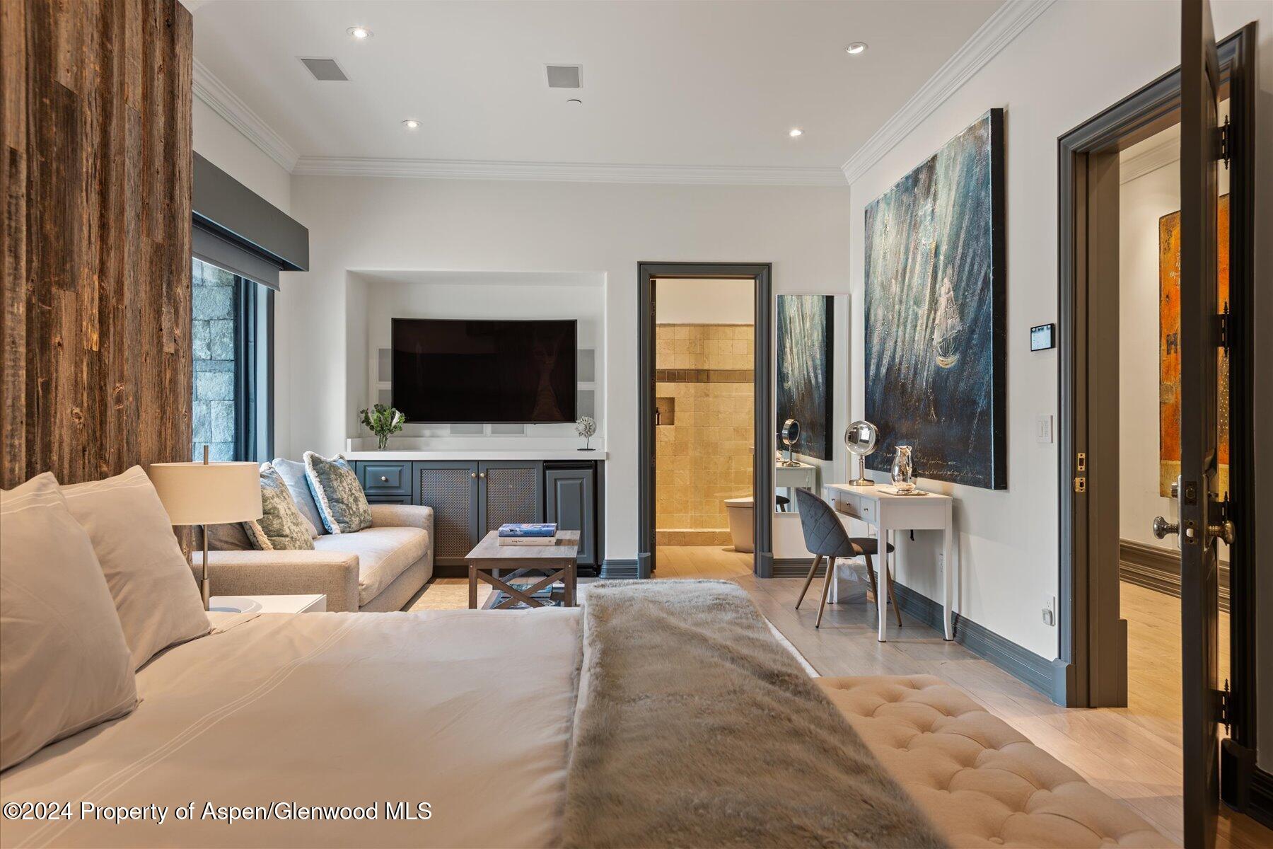 73 Hideaway Lane Aspen, CO 81611 - Photo 74 of 100 a living room with furniture and a flat screen tv