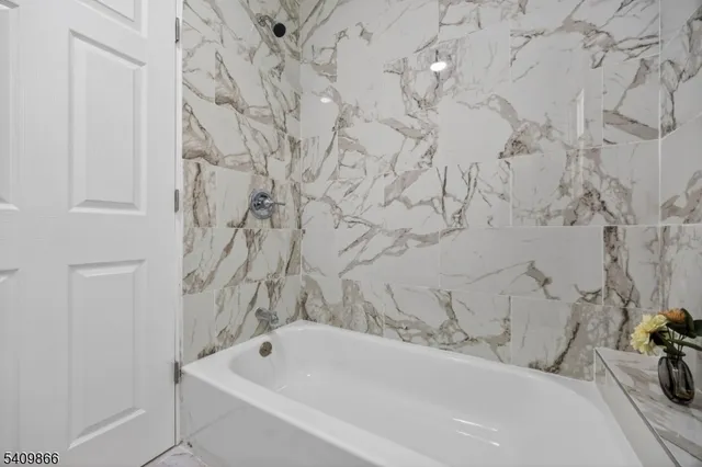 a bathroom with a bathtub