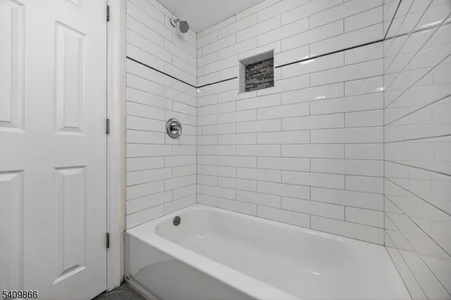 a bathroom with a bathtub