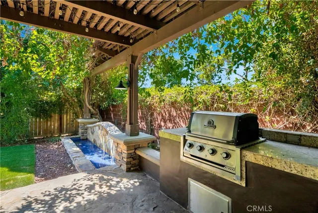 a view of a backyard with sitting area