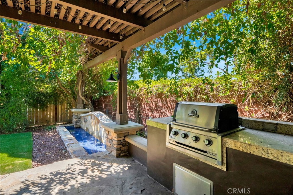 5 Flowerdale Ladera Ranch, CA 92694 - Photo 20 of 22 a view of a backyard with sitting area