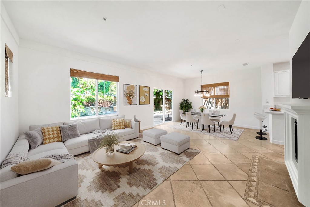 5 Flowerdale Ladera Ranch, CA 92694 - Photo 3 of 22 a living room with furniture and a flat screen tv