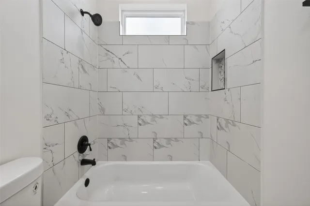 a bathroom with a bathtub