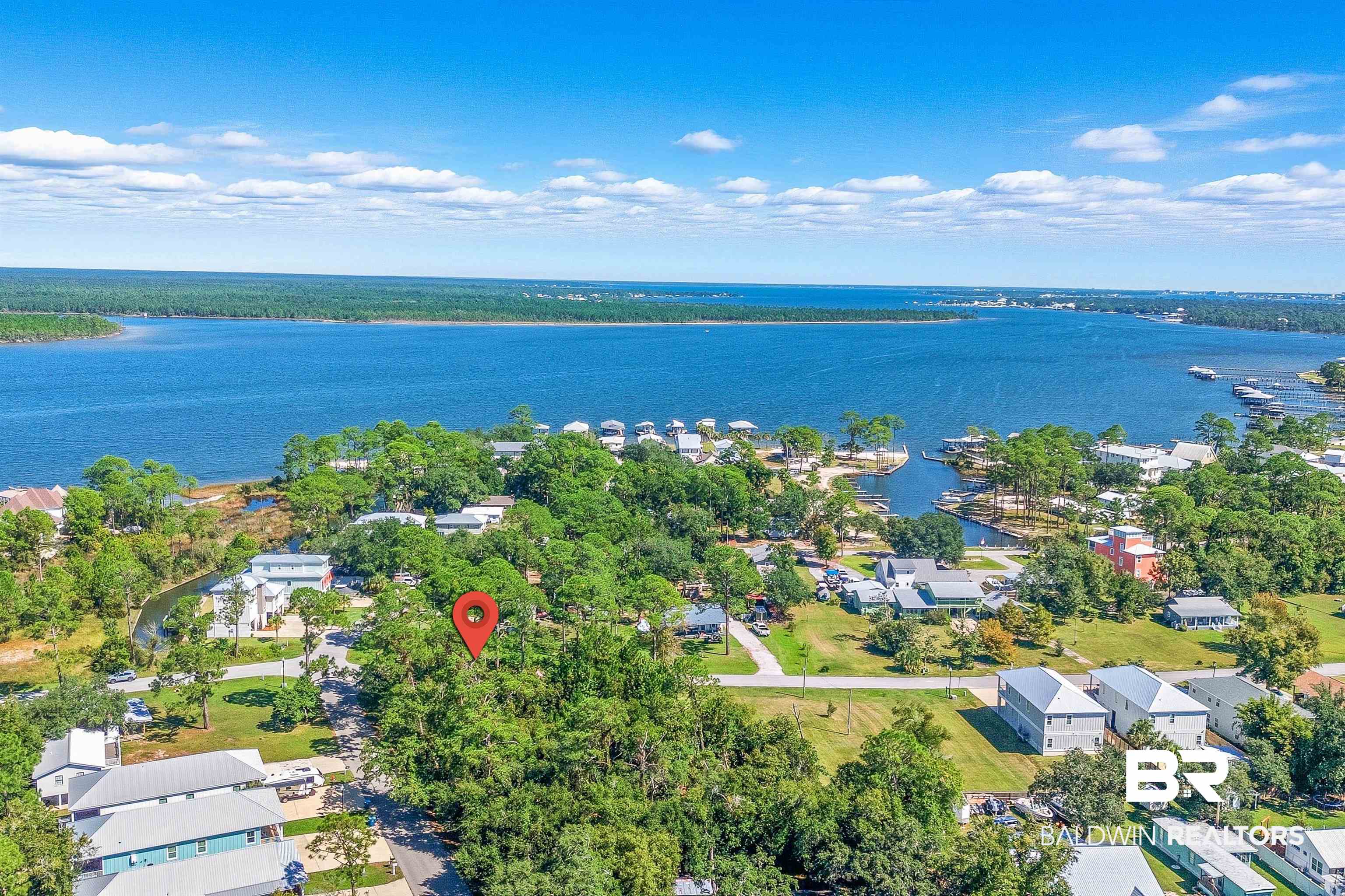 5310 Pine Road Orange Beach, AL 36561 - Photo 3 of 46 Aerial view of residential area featuring a large body of water