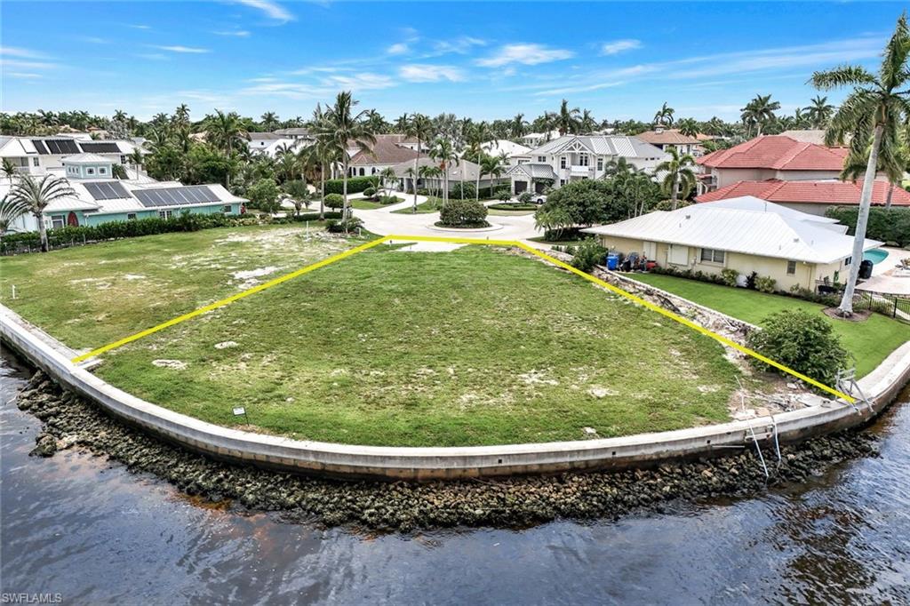 1303 Marlin Drive Naples, FL 34102 - Photo 1 of 15 Drone / aerial view with a water view
