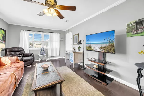 a view of swimming pool with an outdoor seating