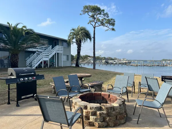 a view of a chairs and table on the terrace