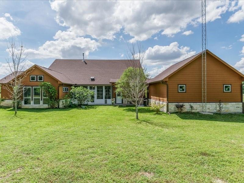 6969 Highway 198 Canton, TX 75103 - Photo 14 of 40 a view of a house with a backyard