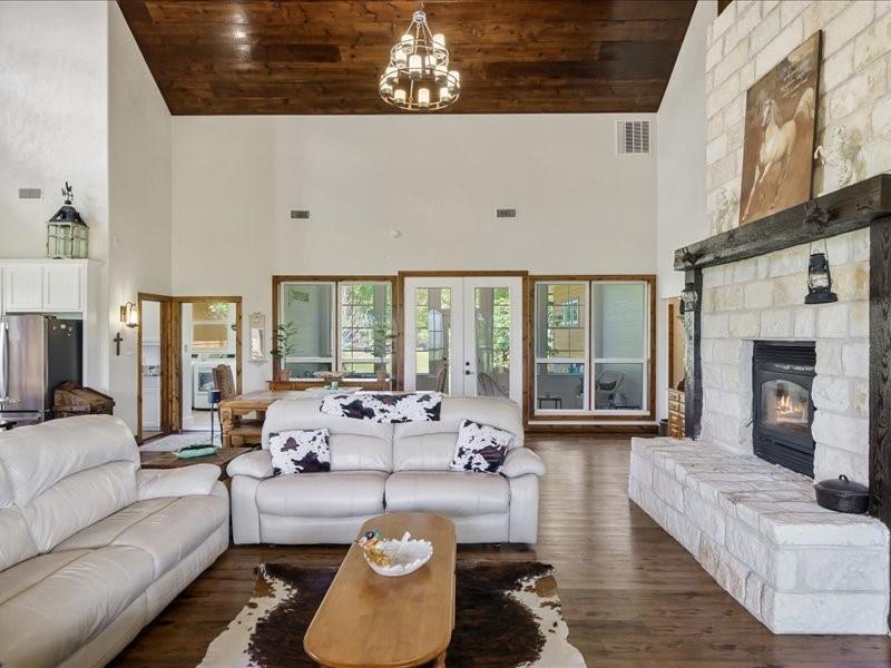 6969 Highway 198 Canton, TX 75103 - Photo 22 of 40 a living room with furniture and a fireplace