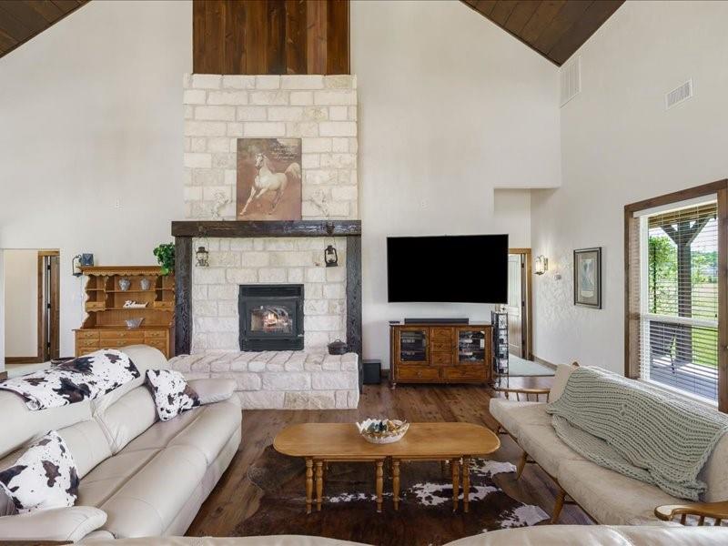 6969 Highway 198 Canton, TX 75103 - Photo 23 of 40 a living room with furniture and a flat screen tv