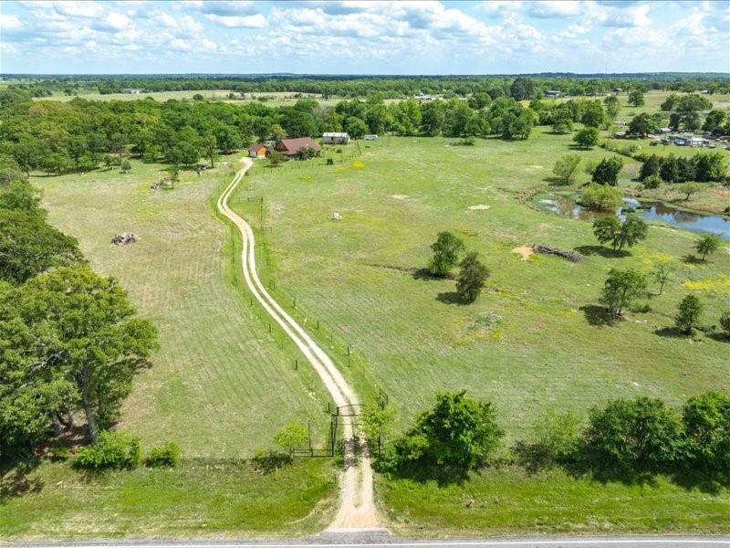 6969 Highway 198 Canton, TX 75103 - Photo 3 of 40 a view of a swimming pool and a yard