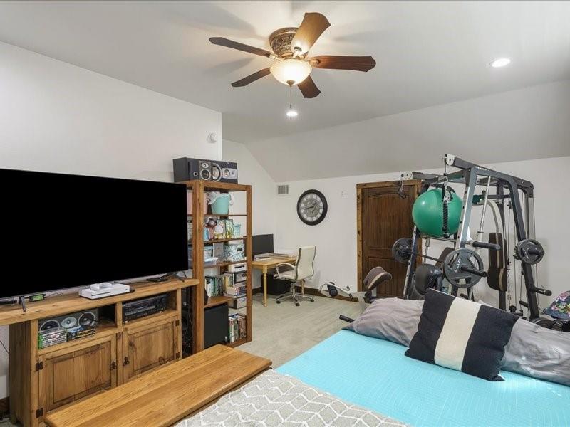 6969 Highway 198 Canton, TX 75103 - Photo 32 of 40 a living room with furniture and a flat screen tv