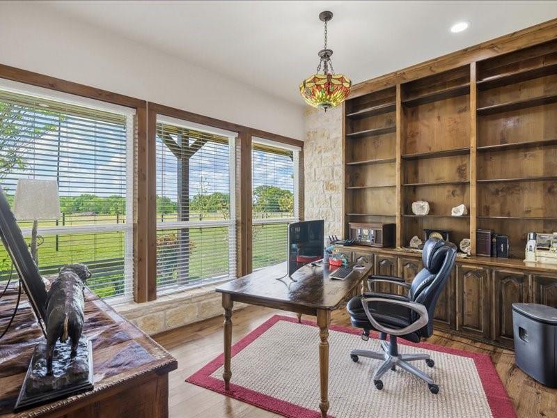 6969 Highway 198 Canton, TX 75103 - Photo 35 of 40 a work room with furniture and a floor to ceiling window