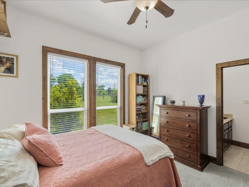 6969 Highway 198 Canton, TX 75103 - Photo 38 of 40 a bedroom with a bed and a dresser