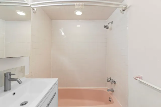 a bathroom with a sink and a bathtub