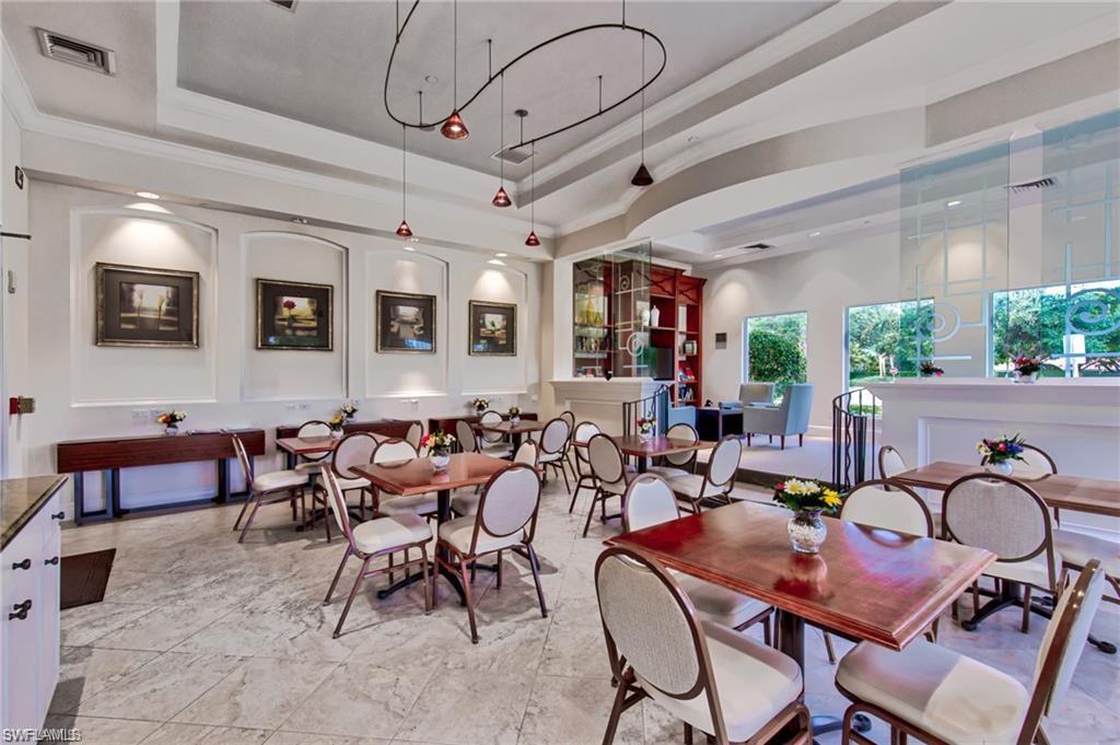 1415 Princess Sabal Point Naples, FL 34119 - Photo 40 of 42 Spacious interior featuring patterned tile flooring, a coved ceiling, recessed lighting, track lighting, and multiple windows