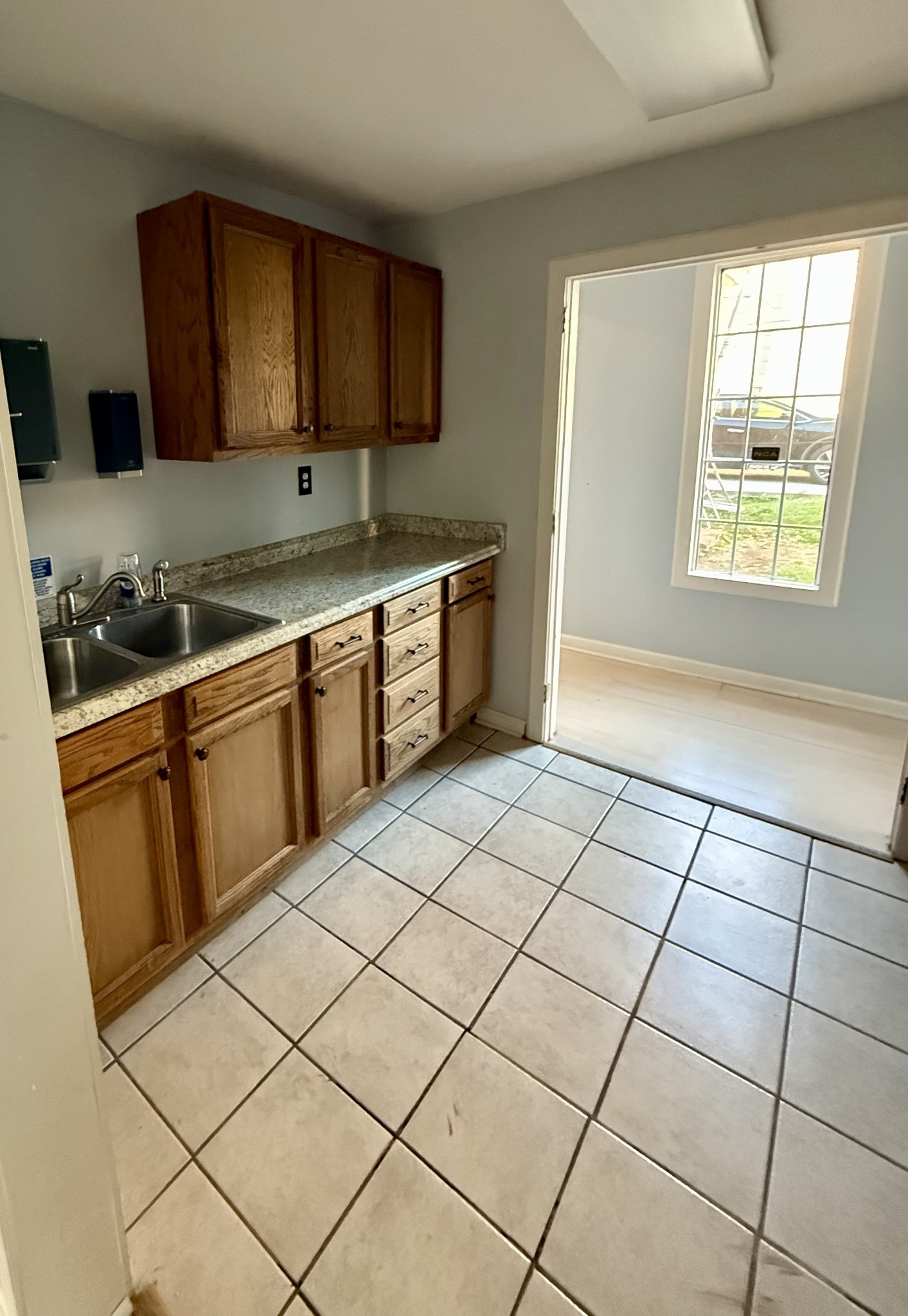 1116 Main Street Pleasant View, TN 37146 - Photo 3 of 29 a kitchen with a stove a sink and a refrigerator