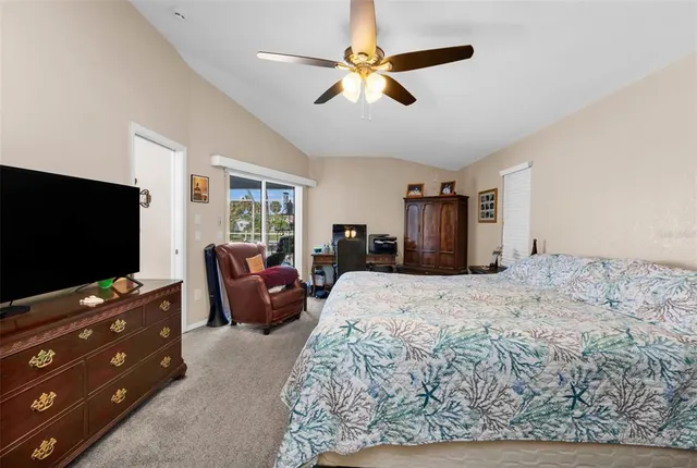 a bathroom with a toilet sink and a mirror
