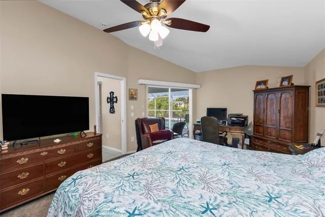 a spacious bathroom with double vanity and a mirror