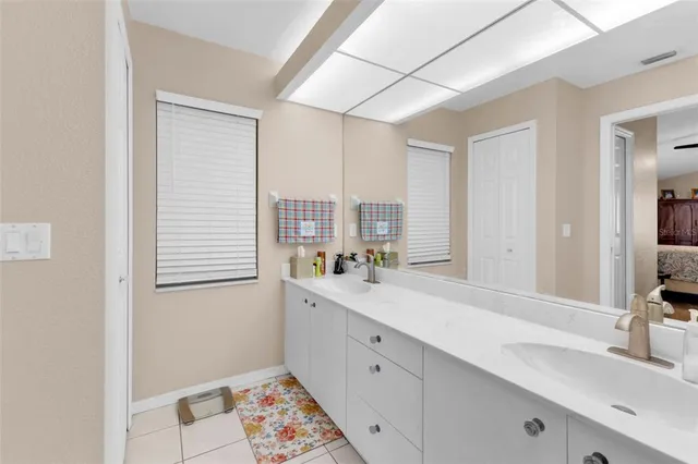 a view of a swimming pool with a lounge chairs