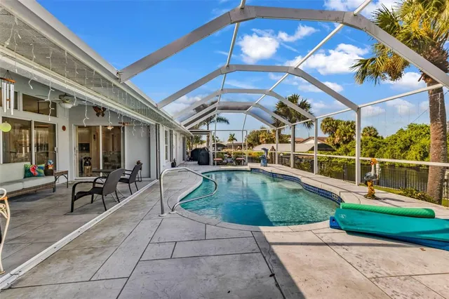 a view of a swimming pool with a lake view