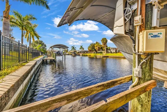 an aerial view of a house with a swimming pool