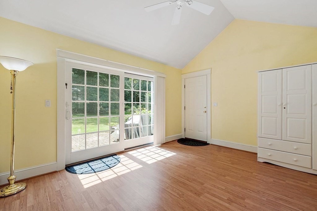 52 Edgewood Road Concord, MA 01742 - Photo 12 of 29 an empty room with wooden floor and windows