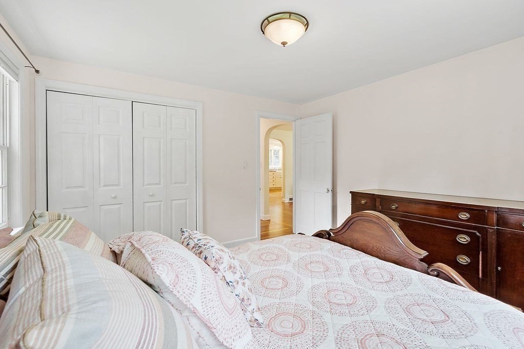 52 Edgewood Road Concord, MA 01742 - Photo 15 of 29 a bedroom with a bed and a dresser