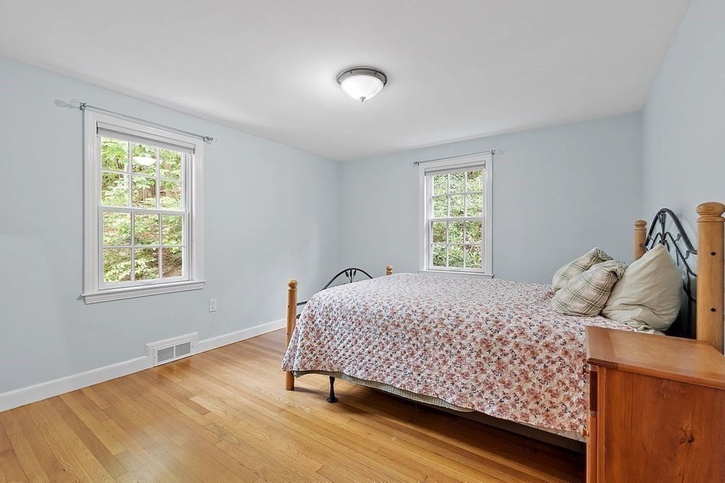 52 Edgewood Road Concord, MA 01742 - Photo 18 of 29 a bedroom with a bed and window