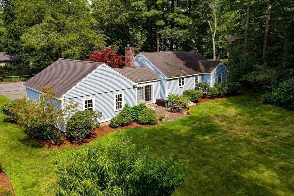 52 Edgewood Road Concord, MA 01742 - Photo 22 of 29 front view of a house with a yard