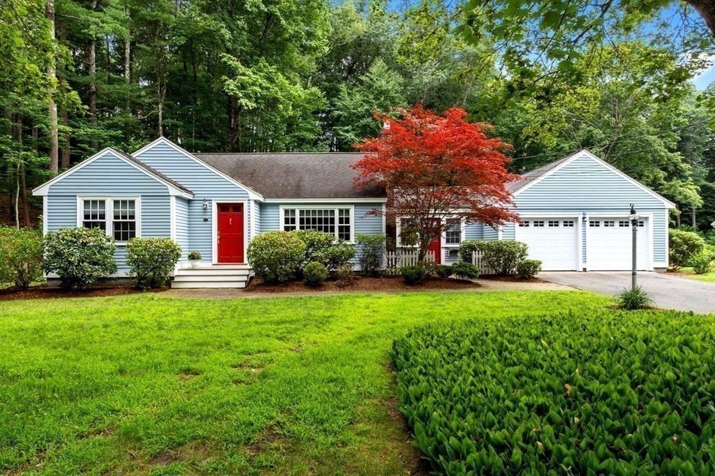 52 Edgewood Road Concord, MA 01742 - Photo 25 of 29 a front view of a house with garden