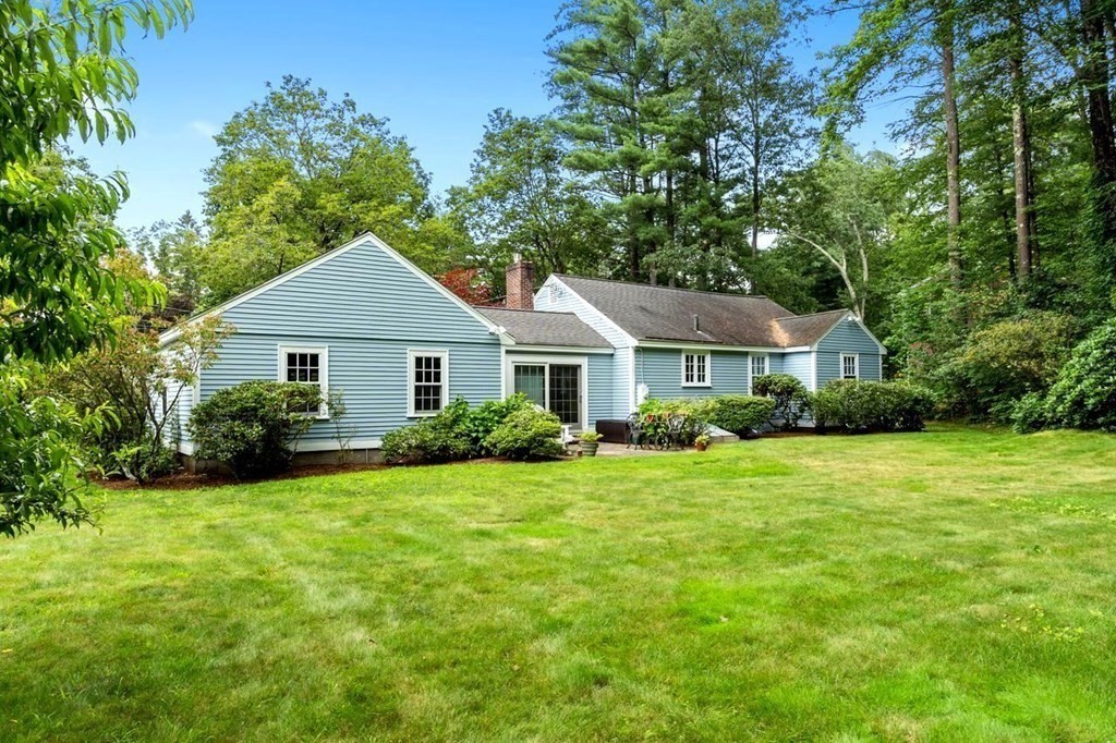 52 Edgewood Road Concord, MA 01742 - Photo 3 of 29 a front view of a house with garden