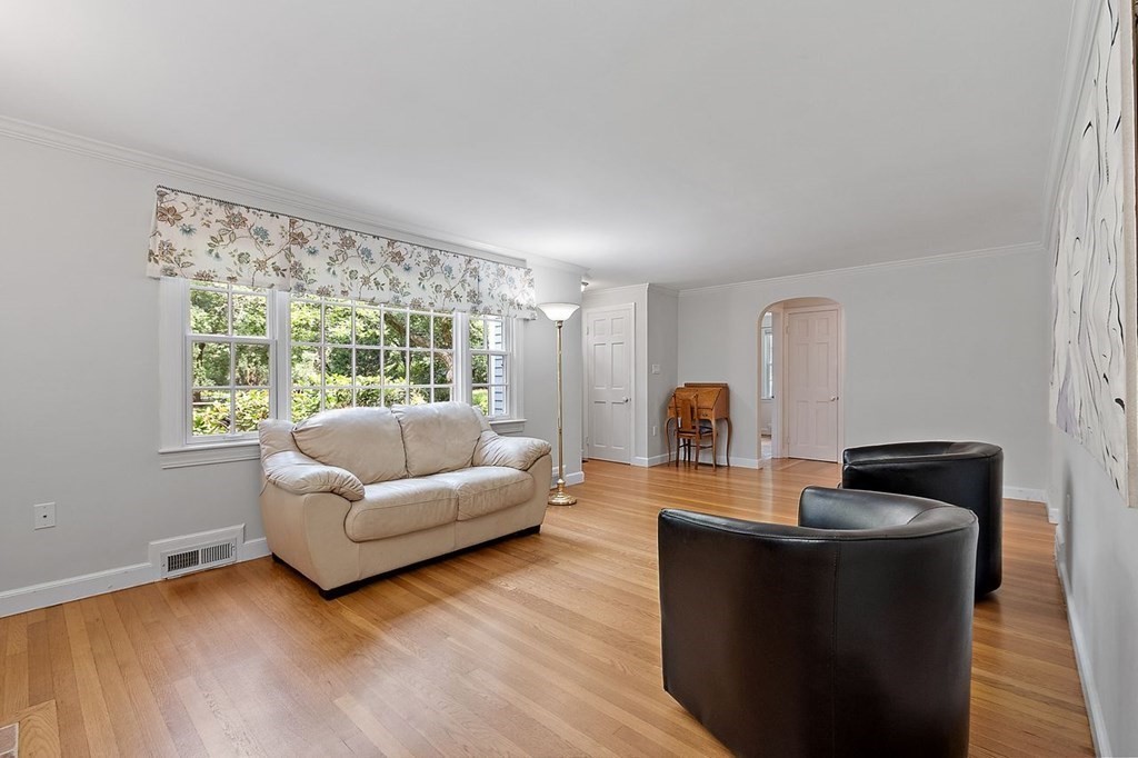 52 Edgewood Road Concord, MA 01742 - Photo 6 of 29 a living room with furniture and a large window