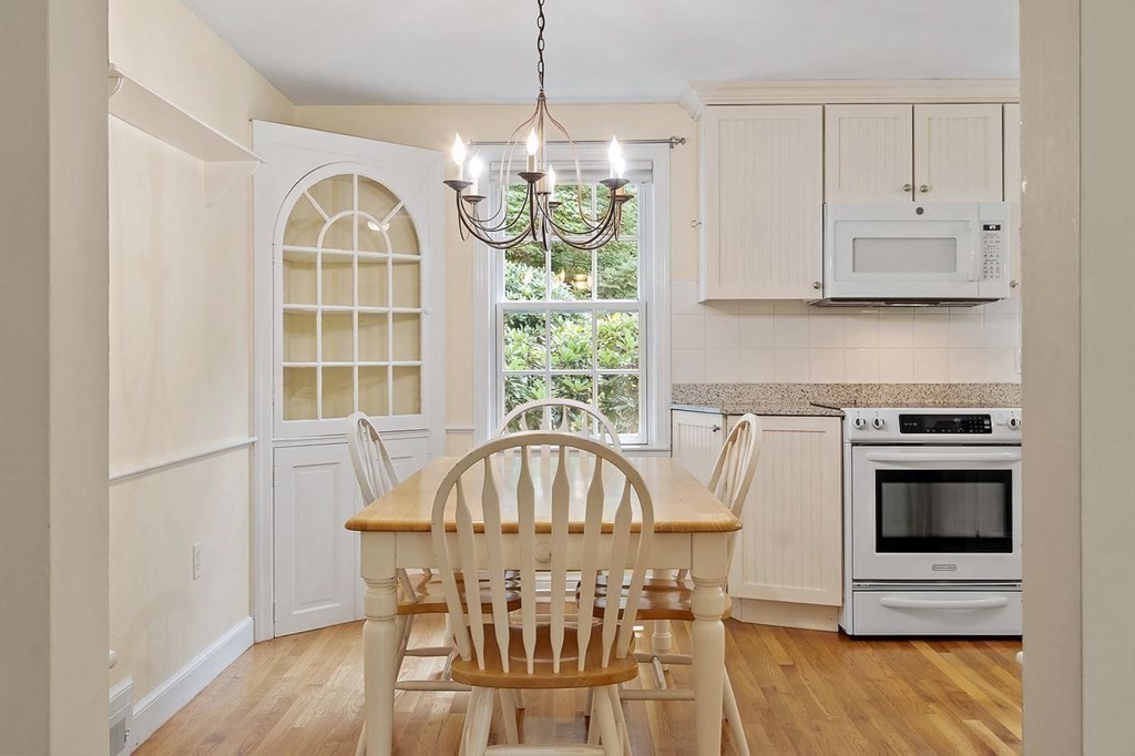 52 Edgewood Road Concord, MA 01742 - Photo 9 of 29 a view of a dining room with furniture window and wooden floor