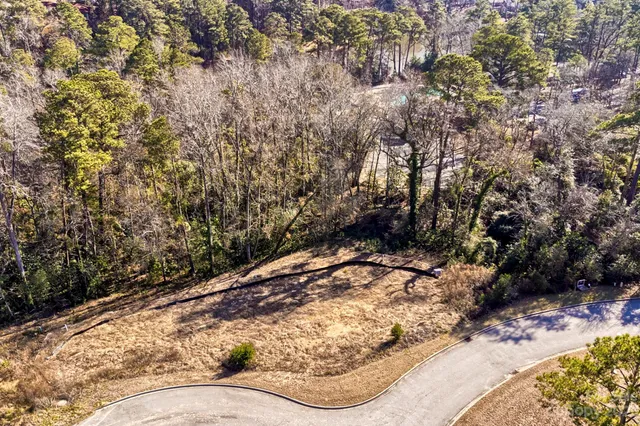 a view of a backyard of the house